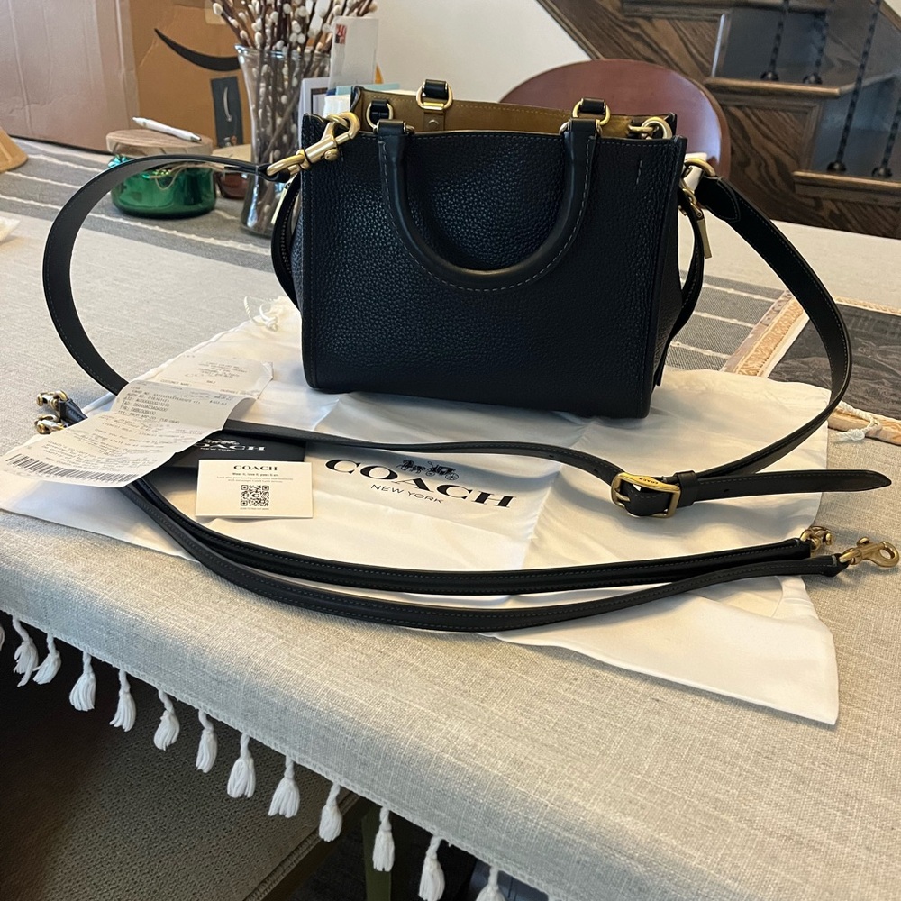 Black pebbled leather Coach purse